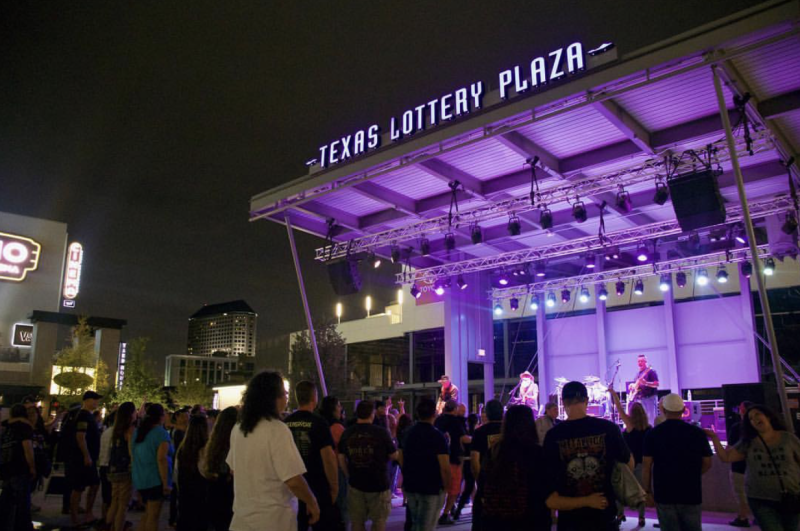 Crowd Watching Live Music At Texas Lottery Plaza In Irving, TX