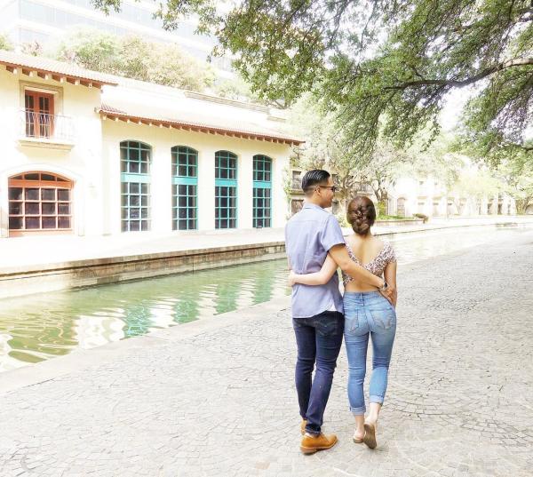 Couple strolling Mandalay Canals