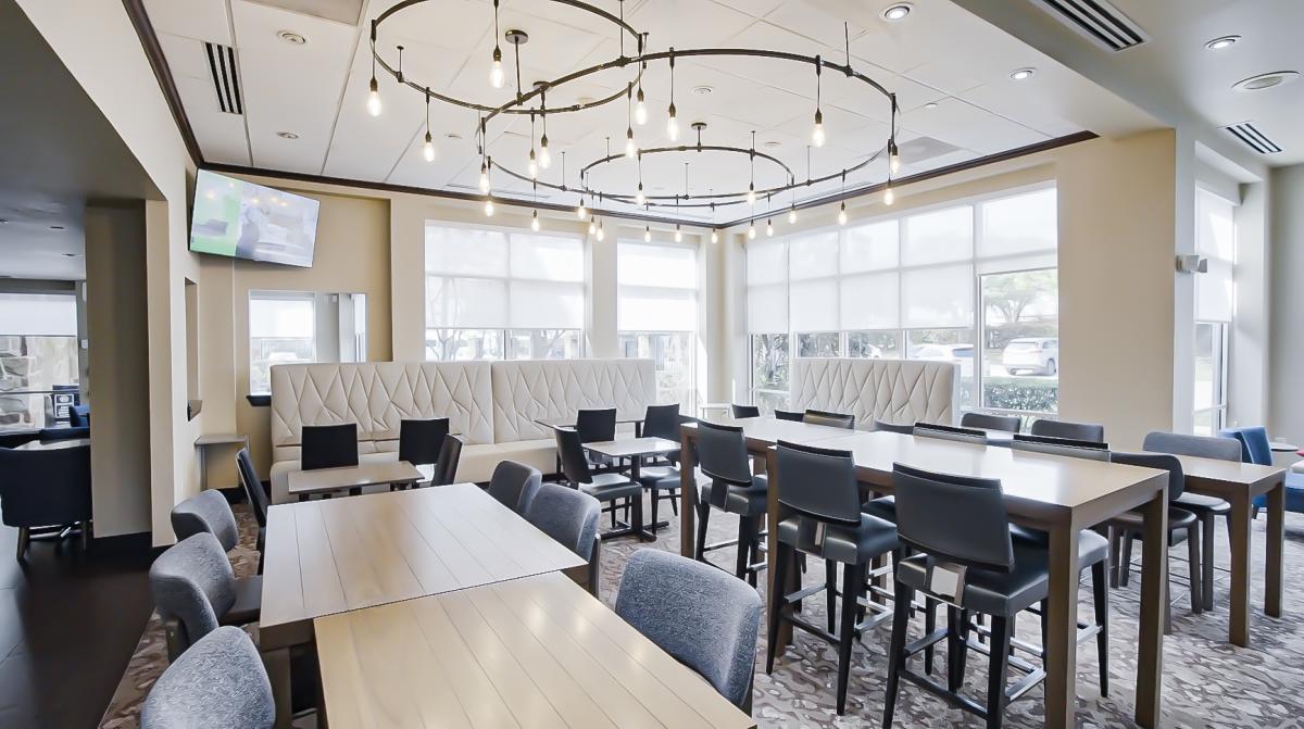 Hilton Garden Inn DFW Airport South interior lobby and dining area