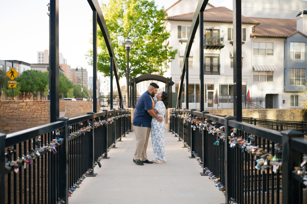 Couple posing at the Love Lock Bridge