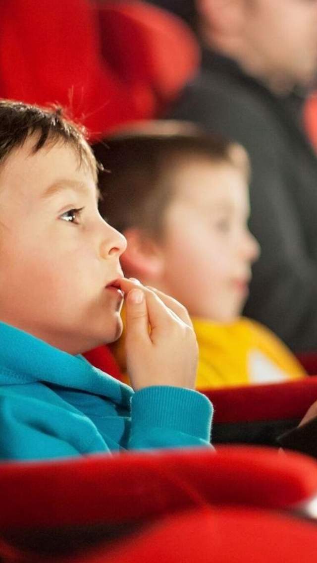 Enjoying a film at the cinema