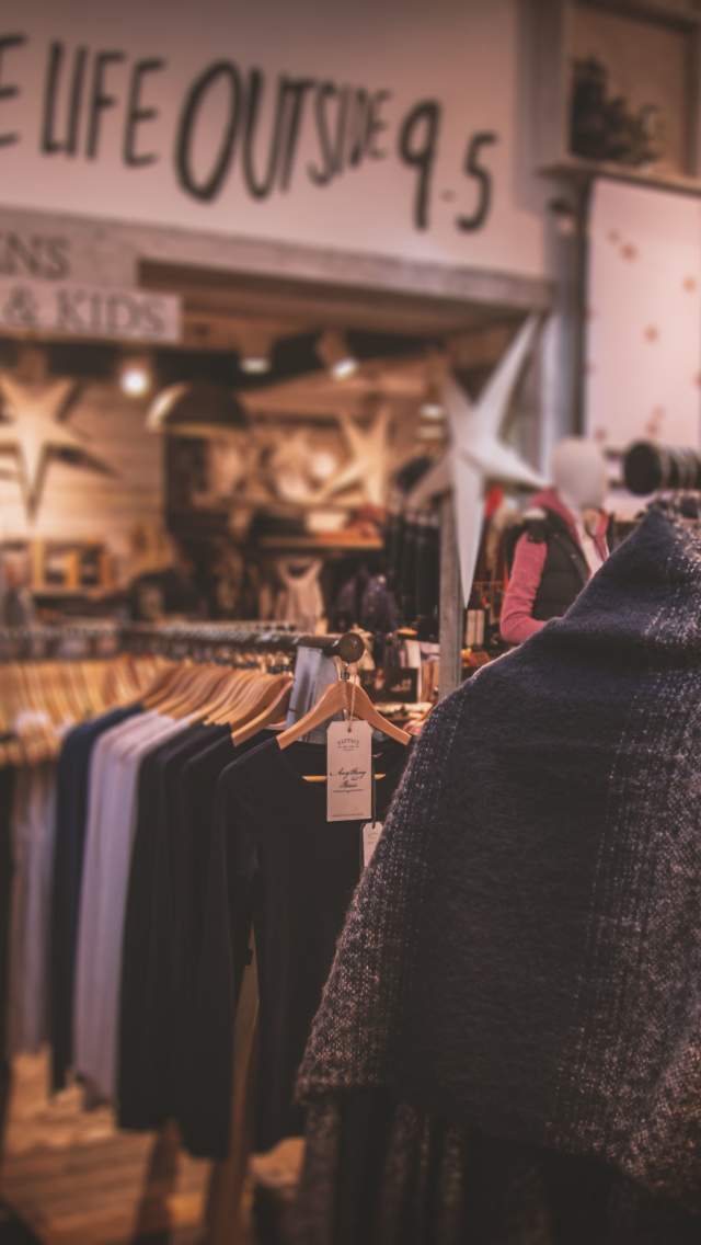 Clothing hanging up in a clothes shop