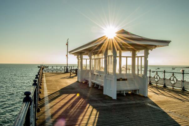 Swanage Pier with starburst sunlight, Dorset credit Richard Murgatroyd