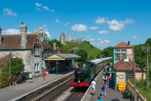 Swanage Railway steam train at Corfe Castle station in Dorset