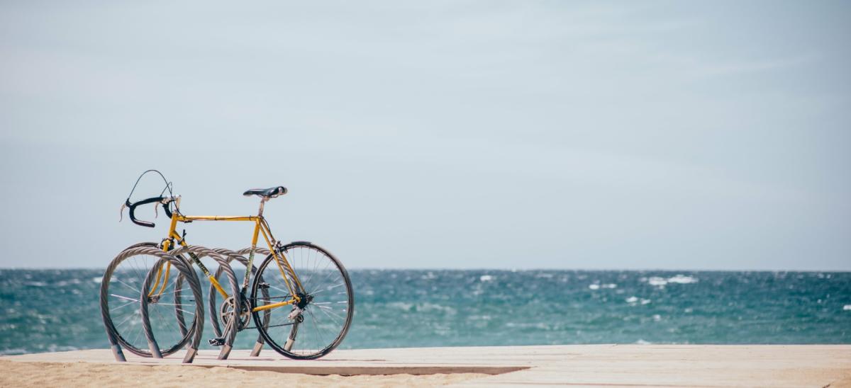 A bike on a sandy beach