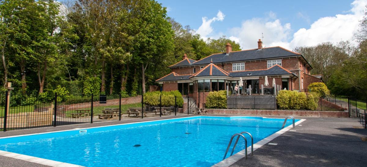 The outdoor swimming pool at Osmington Mills Lodge Park