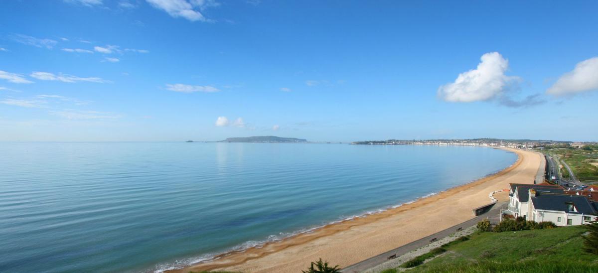 View of Weymouth Bay, the shingle beach and the Isle of Portland in the distance