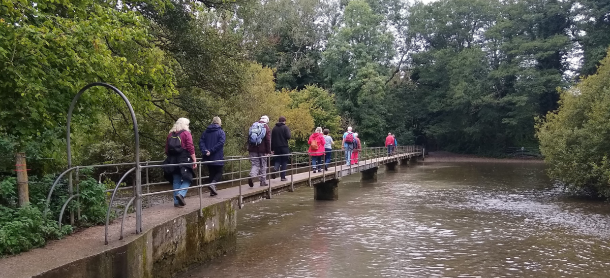 Walkers crossing Moreton Ford