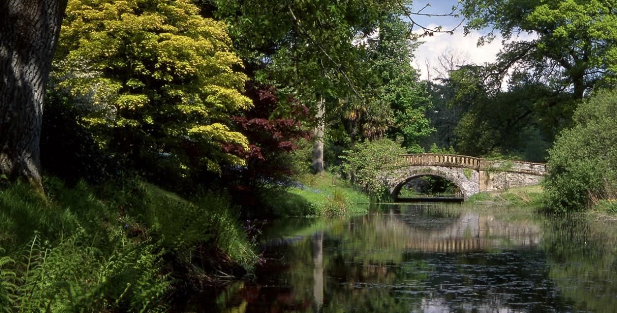 Bridge over water at Minterne House & Gardens